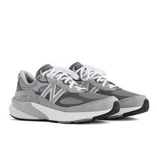 New Balance 990v6 in grey and white with pigskin suede, mesh construction, FuelCell cushioning, ENCAP midsole support.