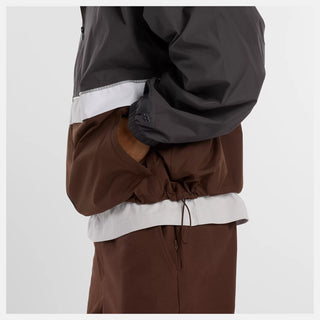 New Balance Numeric Archive Jacket in Faded Black with NB DRY moisture-wicking technology, durable ripstop fabric, 100% recycled polyester, zippered closure, and archive-inspired skate design