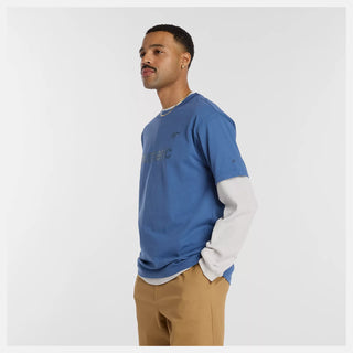 New Balance Numeric Cotton Tee in Magic Blue with 100% cotton jersey fabric, relaxed loose fit, ribbed collar, and rubberized high density branding