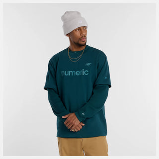 New Balance Numeric Cotton Tee in Medusa Green with 100% cotton jersey fabric, relaxed loose fit, ribbed collar, and rubberized high density branding