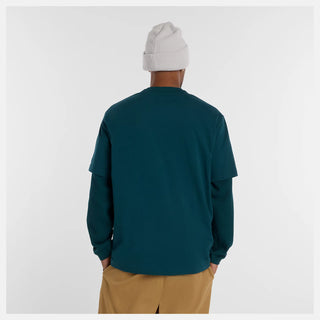 New Balance Numeric Cotton Tee in Medusa Green with 100% cotton jersey fabric, relaxed loose fit, ribbed collar, and rubberized high density branding