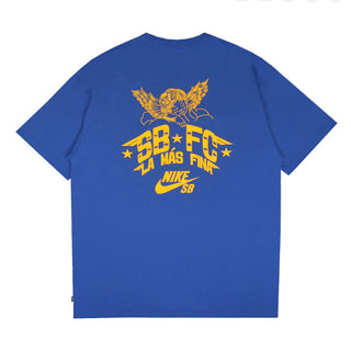 A royal blue short-sleeve t-shirt with a large yellow graphic on the back, featuring an eagle, the text 'SB FC LA MAS FNA', and a Nike SB logo, shown against a plain white background.