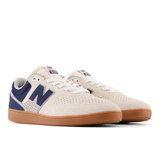New Balance Numeric 508 shoes in Sea Salt/Navy with retro-inspired breathable design and reflective heel.
