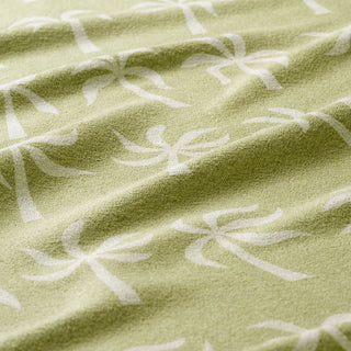 Nomadix Original Towel in Breezy Palms Olive — ultra-absorbent, quick-drying, sand and funk resistant, made from 90% recycled polyester, 72.5" x 30"