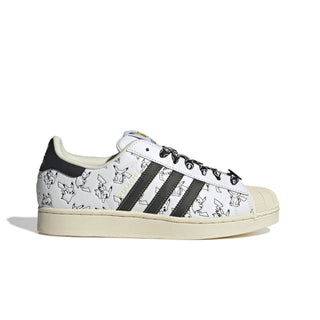 adidas Originals Pokémon Superstar II "Pikachu" in Footwear White/Core Black/Gold Metallic — leather upper with shelltoe design, Pikachu character visuals, Pokéball laces, Pikachu tail lace jewel, padded tongue and heel, rubber outsole