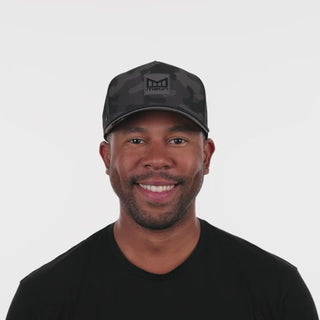 melin Odysea Stacked Hydro Hat in Black Camo — hydrophobic crown panels, water repellant, floatable, and breathable with moisture-wicking lining and hidden besom pocket