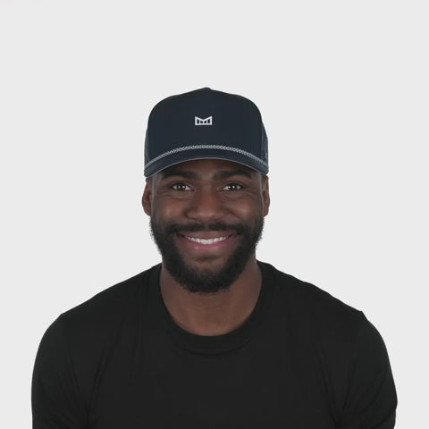 melin Odysea Rope Bulls Icon Hydro Hat in Navy — curved visor, high-crown trucker style with water-friendly, floatable HYDRO performance and moisture-wicking lining