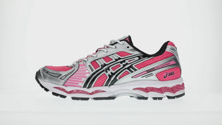 ASICS GEL-KAYANO 12.1 in Dragon Fruit and Black with layered mesh upper and metallic-inspired overlays.