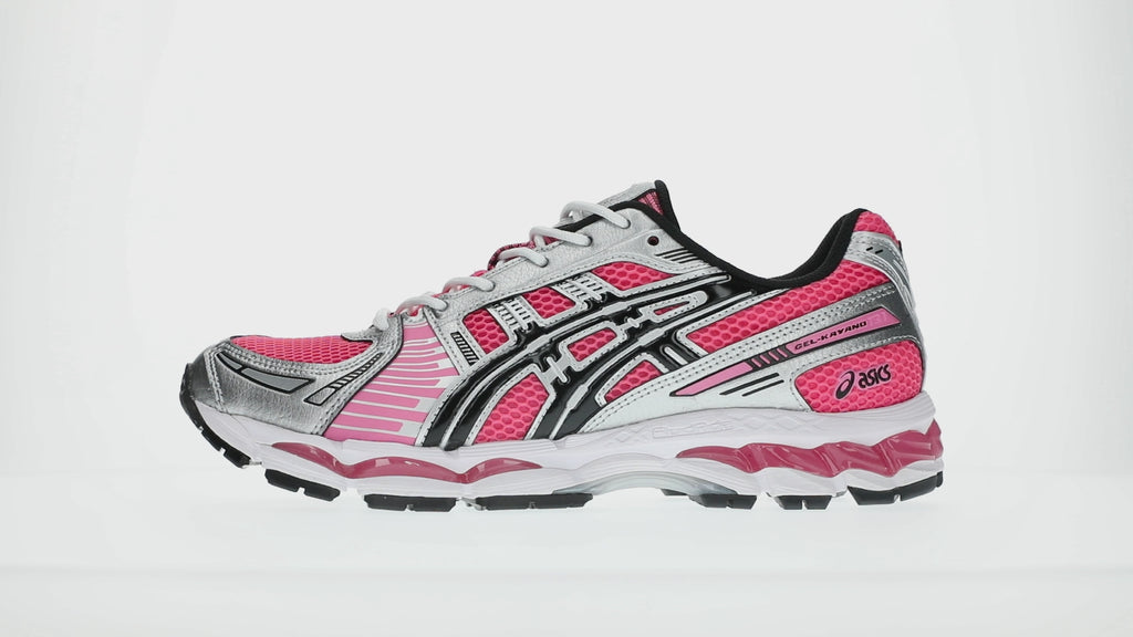 ASICS GEL-KAYANO 12.1 in Dragon Fruit and Black with layered mesh upper and metallic-inspired overlays.