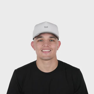 melin Odysea Rope Bulls Icon Hydro Hat in White/Grey with a white crown, grey curved visor and front logo, patterned rope trim, and perforated side panels.