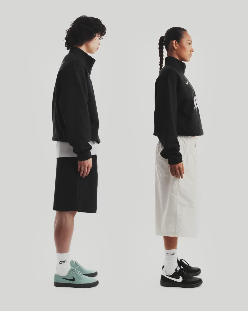 Nike SB Club 58 black half-zip fleece sweatshirt with adjustable hem and relaxed fit.