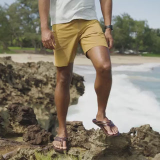 OluKai Mea Ola Leather Sandals in Dark Java/Dark Java — premium full-grain leather with canoe lash whipstitching, octopus laser-etched footbed, microfiber lining, and handsewn leather toe post
