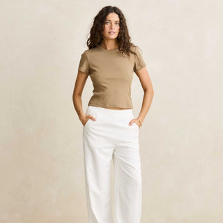 Rhythm Everyday Rib Tee in Brown, baby tee silhouette in ribbed stretch fabric with scoop neckline, soft trim, and tonal chest embroidery in a 46% cotton 46% viscose 8% spandex blend