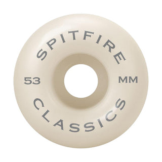 Set of 4 Spitfire Formula Four Classic wheels, white/orange swirl, medium profile, smooth surface.