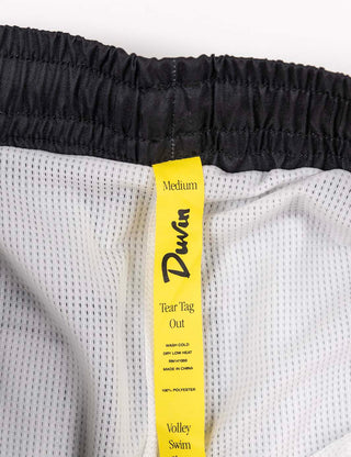 Duvin Ski Grand Prix Swim Short, 100% polyester, wide-leg relaxed fit, premium liner, velcro back pocket with drain hole.