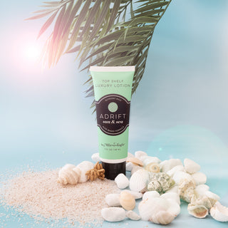 Mixologie Adrift Lotion, refreshing ocean scent with bergamot, bamboo, jasmine, enriched with natural oils, hydrating.