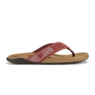 OluKai Tuahine Leather Beach Sandal in Red Ochre/Tan — waterproof full-grain leather with Hawaiian-inspired stitching, anatomically contoured footbed, and non-marking wet grip outsole