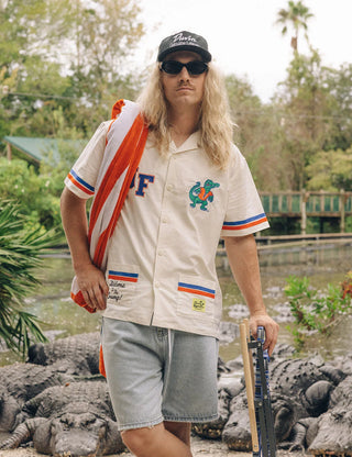  Duvin x Florida Gators Cabana Shirt in Off White with embroidered UF and Gator chest details, contrast paneling, camp collar, and dual patch pockets.