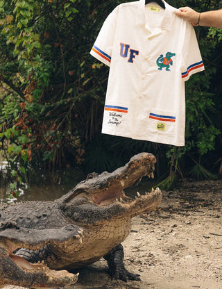 Duvin x Florida Gators Cabana Shirt in Off White with embroidered UF and Gator chest details, contrast paneling, camp collar, and dual patch pockets.