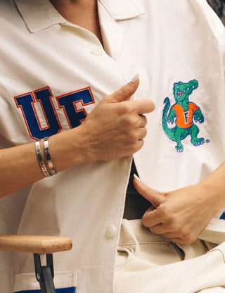  Duvin x Florida Gators Cabana Shirt in Off White with embroidered UF and Gator chest details, contrast paneling, camp collar, and dual patch pockets.