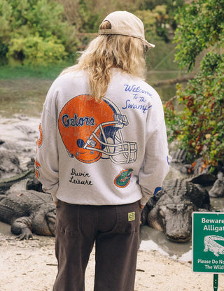 Duvin x Florida Gators Crew Fleece in Grey with UF lettering, Albert the Gator, palm trees, “Welcome to the Swamp” graphics, and sleeve lettering.