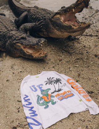 Duvin x Florida Gators Crew Fleece in Grey with UF lettering, Albert the Gator, palm trees, “Welcome to the Swamp” graphics, and sleeve lettering.