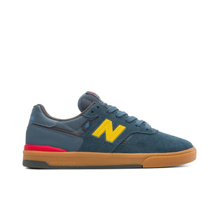 New Balance Numeric Jamie Foy 306 Cup in Shadow Blue/Mars Yellow — Jamie Foy signature cupsole skate shoe with suede and mesh upper, hidden toe protection, molded EVA insole, and gum rubber outsole