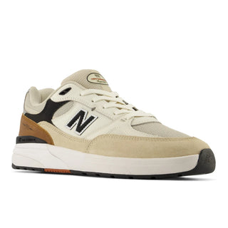 New Balance Numeric Andrew Reynolds 933 shoes in Quicksand and Sea Salt with suede, mesh, and low-top design.