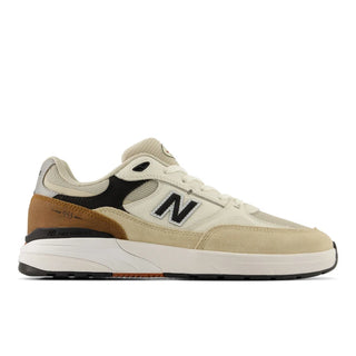 New Balance Numeric Andrew Reynolds 933 shoes in Quicksand and Sea Salt with suede, mesh, and low-top design.
