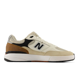 New Balance Numeric Andrew Reynolds 933 shoes in Quicksand and Sea Salt with suede, mesh, and low-top design.