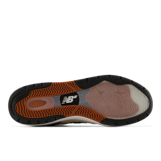 New Balance Numeric Andrew Reynolds 933 shoes in Quicksand and Sea Salt with suede, mesh, and low-top design.