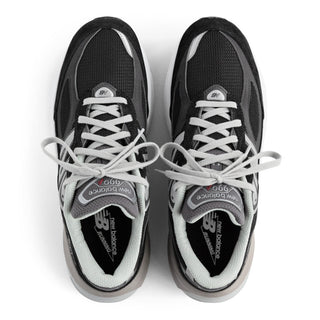 New Balance Made in USA 990v6 sneaker in black and white with pigskin suede, mesh overlays, and FuelCell cushioning.