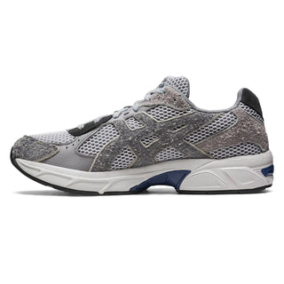 ASICS GEL-1130™ sneaker with suede and leather paneling. GEL™ technology cushioning for shock absorption. A tribute to the GEL-1000™ series from 2008