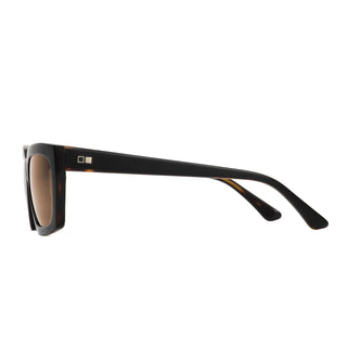 OTIS Eyewear Valentine sunglasses in polished black with vanilla detailing, unisex frame with mineral glass lenses.