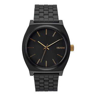 Nixon Time Teller Matte Black/Gold analog watch with black stainless steel bracelet and gold-tone dial accents.