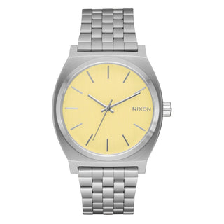 Nixon Time Teller Silver/Butter analog watch with stainless steel bracelet and soft butter-yellow dial.