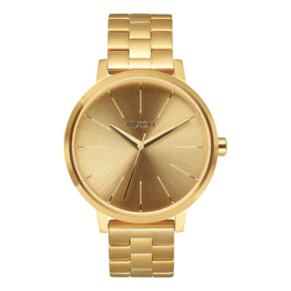 Image of Nixon Kensington All Gold Watch - a timeless and elegant timepiece with engraved and printed dial indices, solid stainless steel case, and matching bracelet.