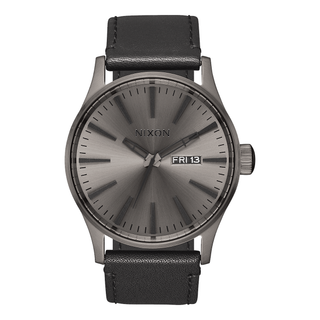 Image of the Nixon Sentry Leather Gunmetal and Black Watch, a classic dress watch with a gunmetal grey dial and black leather strap.