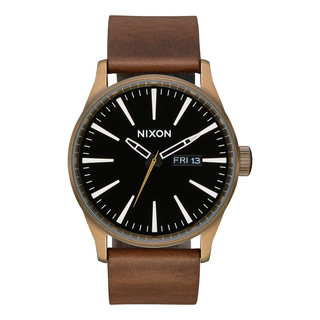 Image of the Nixon Sentry Leather Blue and Brown Watch, a classic dress watch with a black dial and brown leather strap.