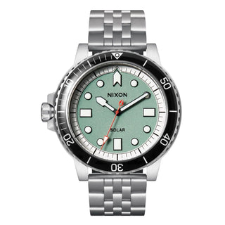 Nixon Stinger 44 Watch in Silver with jade dial, luminous indices, and stainless steel bracelet.