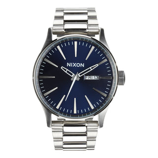 Nixon Sentry Blue Sunray analog watch with stainless steel bracelet and textured blue sunray dial.