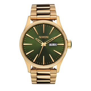 Nixon Sentry Gold/Green Sunray analog watch with gold stainless steel bracelet and green sunray dial.