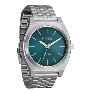 Nixon Time Teller Solar in silver/dusty blue sunray- Iconic watch with a larger 40mm case, quick-release 5-link bracelet, and 100m waterproof rating.