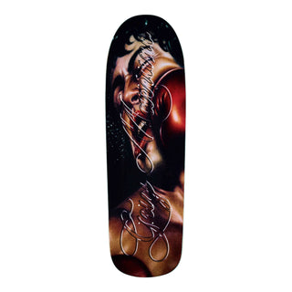  “April Guy Mariano Knockout 1990 Shape skateboard deck with full-board boxing artwork, a red glove, and oversized Guy Mariano script lettering.”