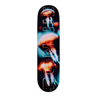 “April Mini Ronnie Kessner Biolume skateboard deck with orange jellyfish, turquoise trails, and large outlined lettering on a black background.”