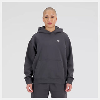 New Balance Women's oversized hoodie, '90s-inspired, soft French terry, minimal branding, 100% cotton.