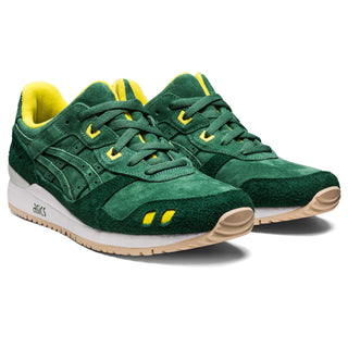Image of ASICS Gel-Lyte III OG Shamrock sneakers, featuring a shamrock green colorway with leather overlays and perforated details on the upper. The sneakers have a split tongue and gel cushioning system for added support and comfort.