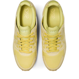 A pair of Matcha green and beige ASICS Gel-Lyte V sneakers with a suede and canvas upper, lace-up closure, and ASICS branding on the tongue and heel.
