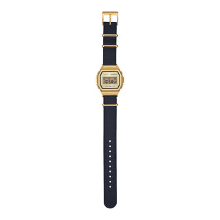 Casio A1000MGN-9 watch with gold-tone stainless steel bracelet and matching case, black dial with digital display, stopwatch, countdown timer, alarm function, water resistance up to 100 meters, quartz movement, mineral crystal lens, and LED backlight.
