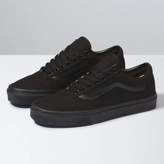 Image of the Vans Old Skool Canvas Shoe. The shoes feature a classic design with a sturdy canvas upper, iconic side stripe, and a signature waffle outsole for superior grip.